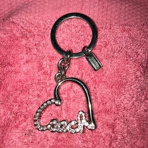 Coach pink heart crystal keychain.